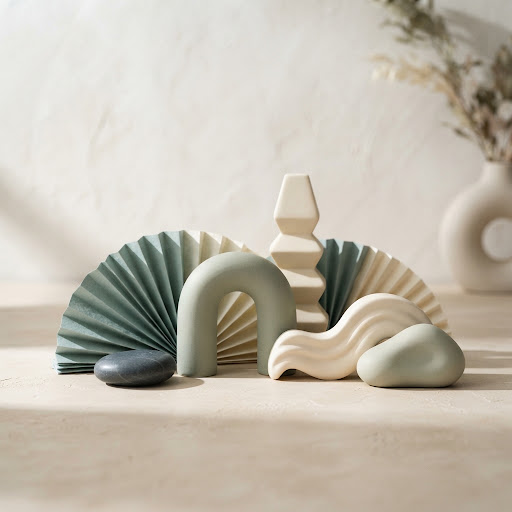 Abstract sculptural composition in sage green and ivory, evoking a calm, guided self-assessment